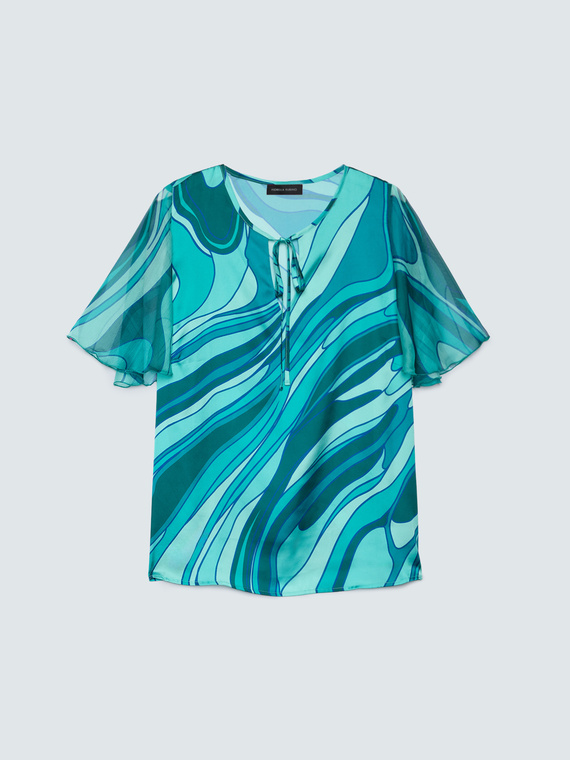 Blusa bimaterica con stampa