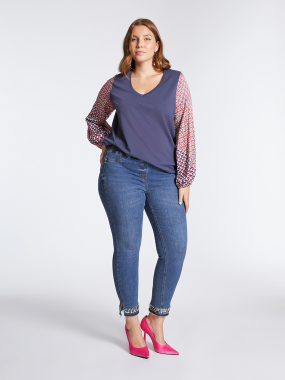 Jeggings with appliqué at the hem