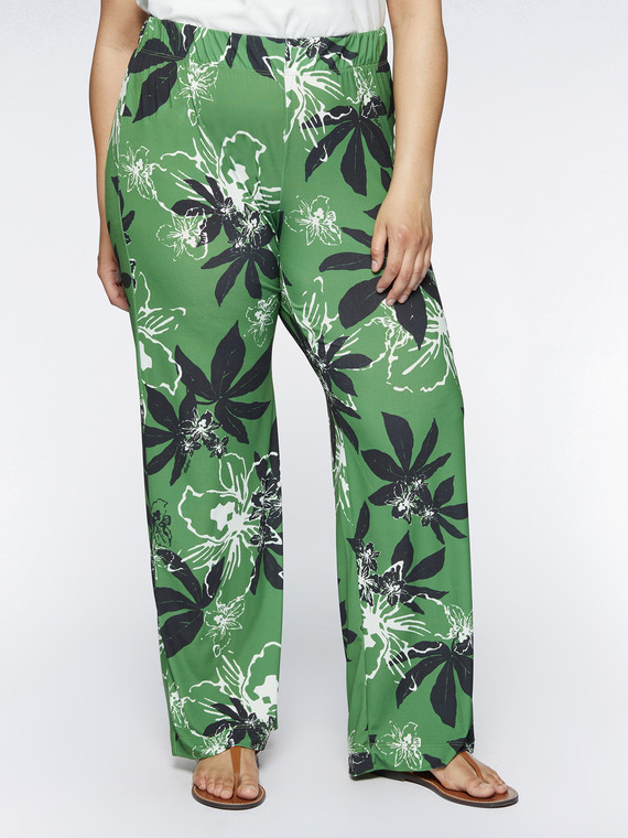Pantalones en tejido de punto con estampado de hojas