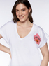 Camiseta con flor y nudo image number 3