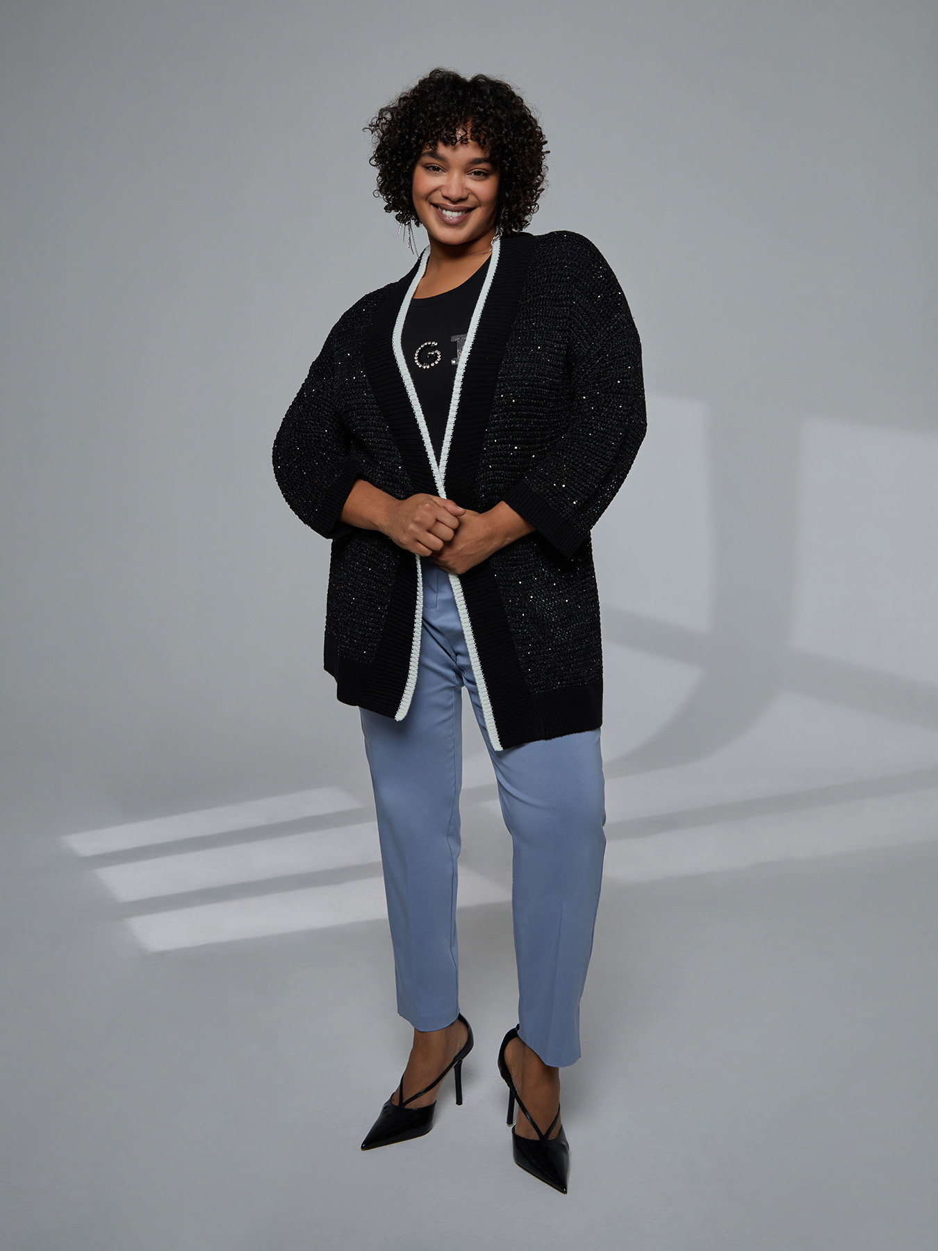 Long cardigan with white trims and tiny sequins image number 1