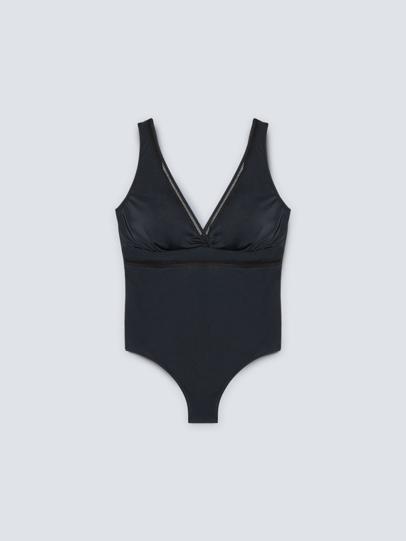 One-piece swimsuit with net trims
