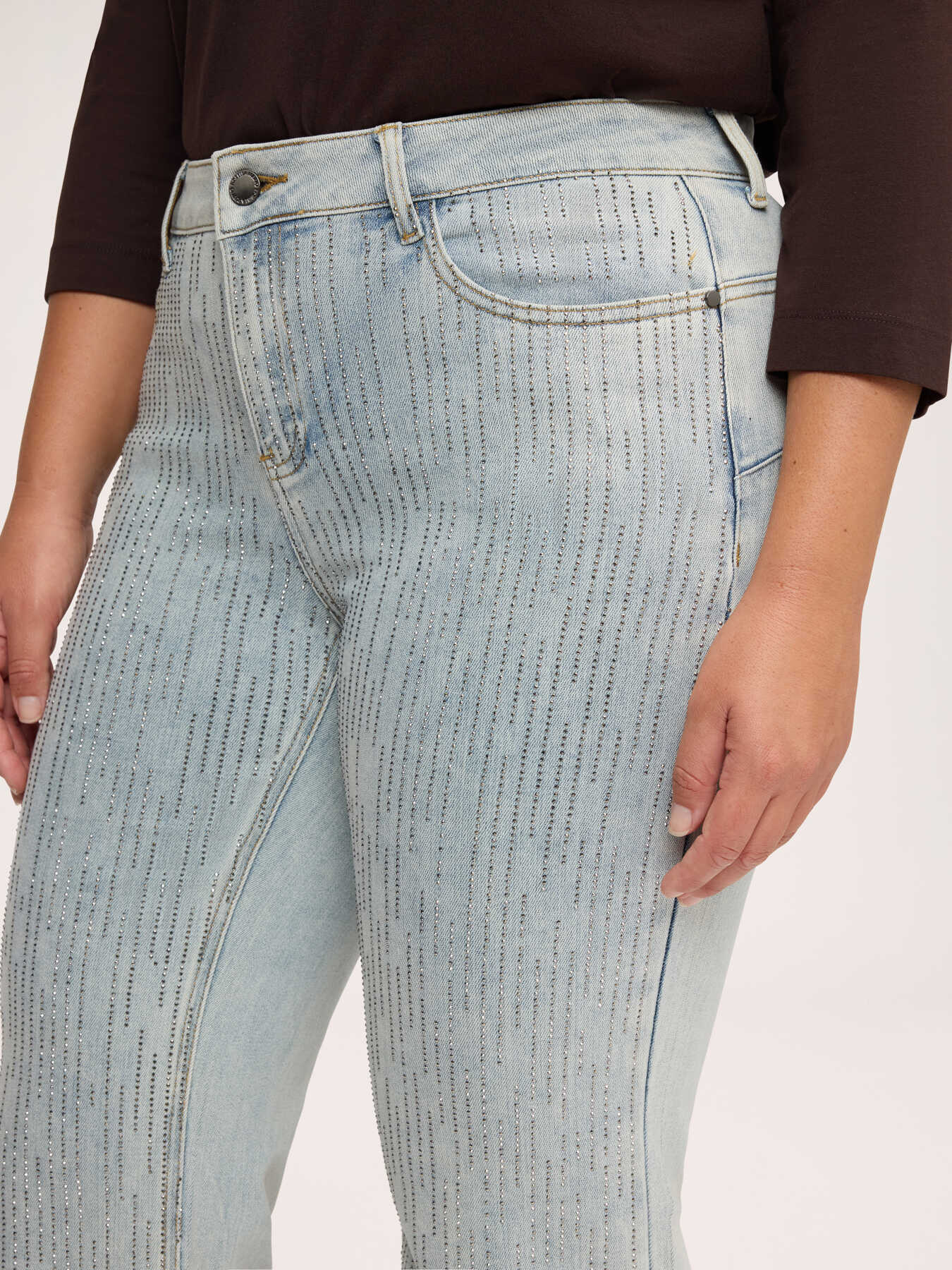 Light wash flared jeans with rhinestones image number 3