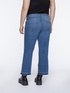 Jeans cropped con borchie al fondo image number 1