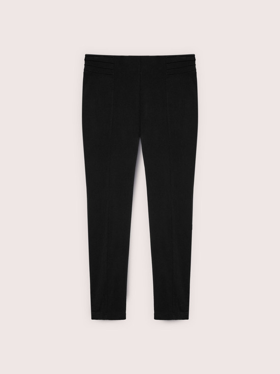 Jeggings con piega frontale e bottoni decorativi
