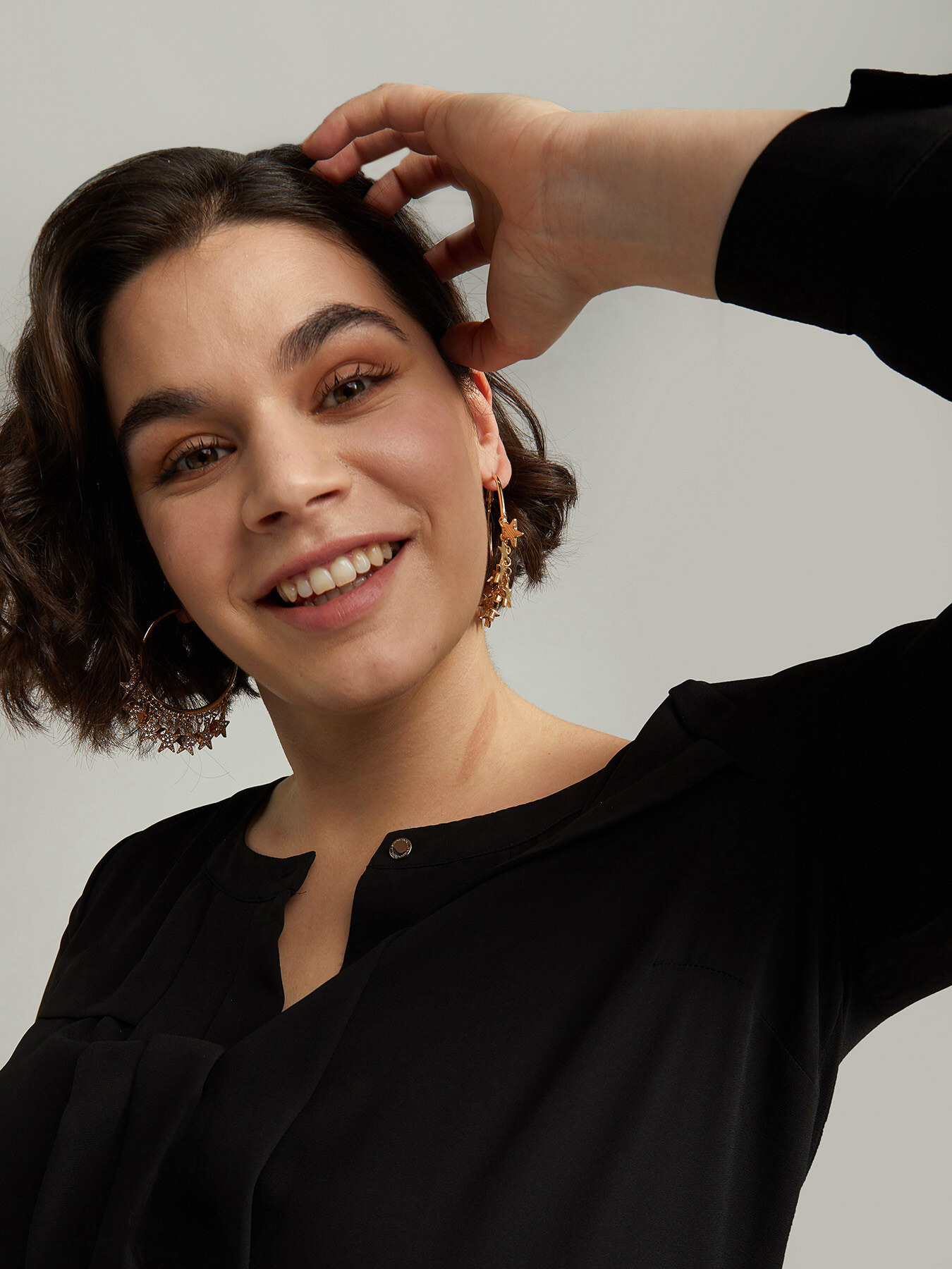 Pendientes de aro con estrellas image number 2