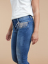 Jeans skinny con frange di cristalli image number 2
