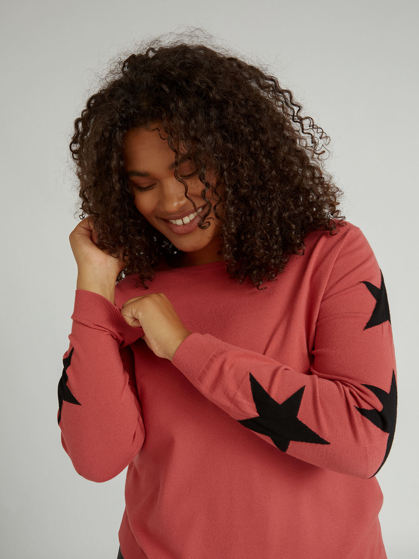 Sweater with stars on the sleeves image number 2