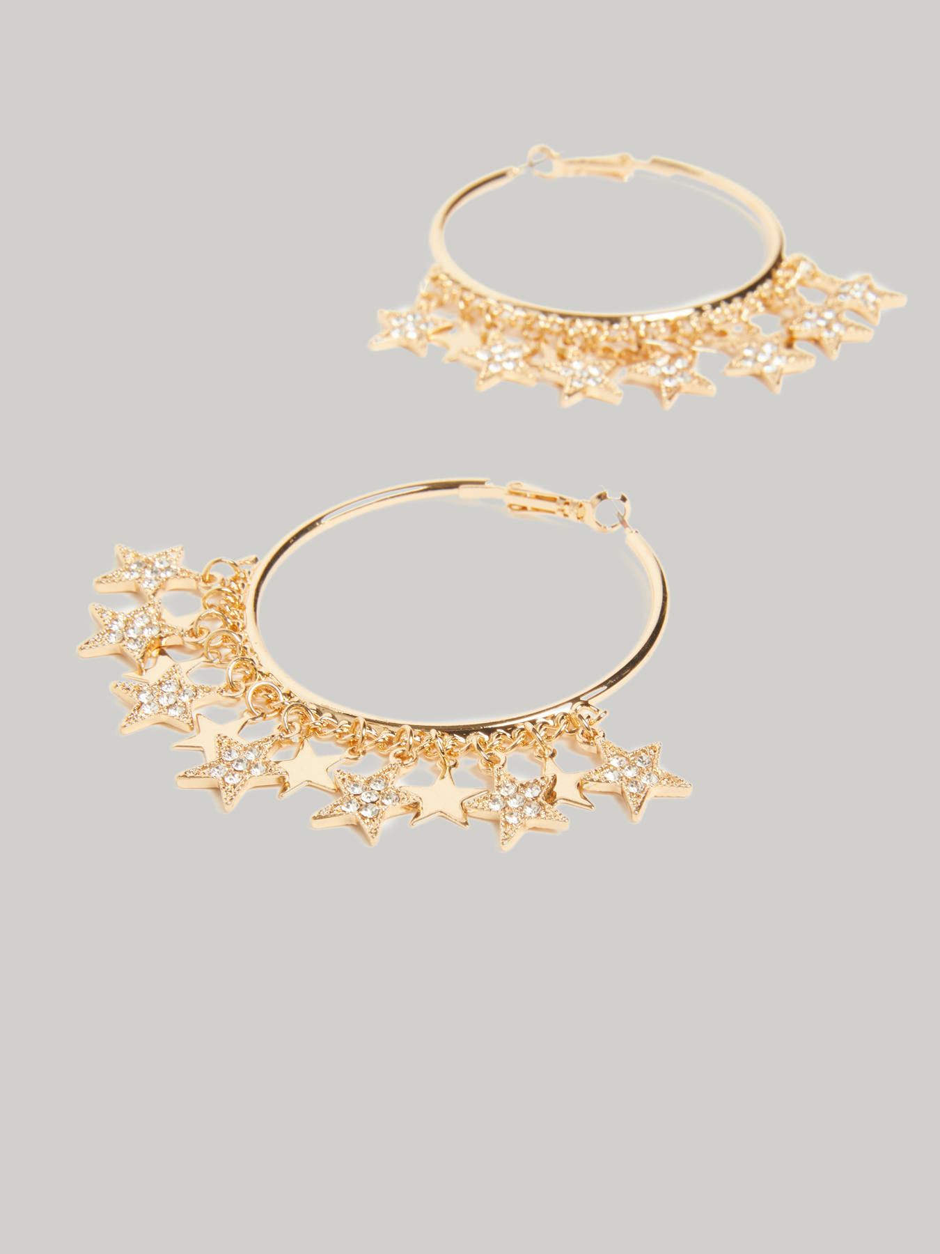 Pendientes de aro con estrellas image number 1