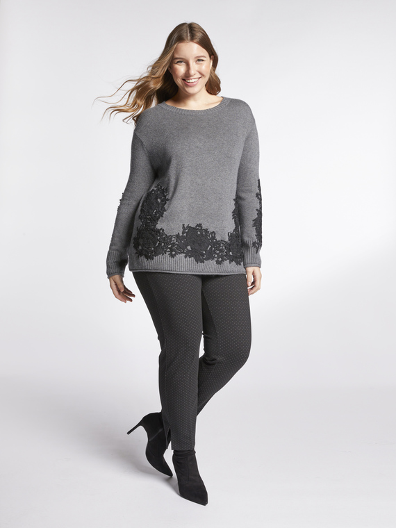 Sweater with placed lace