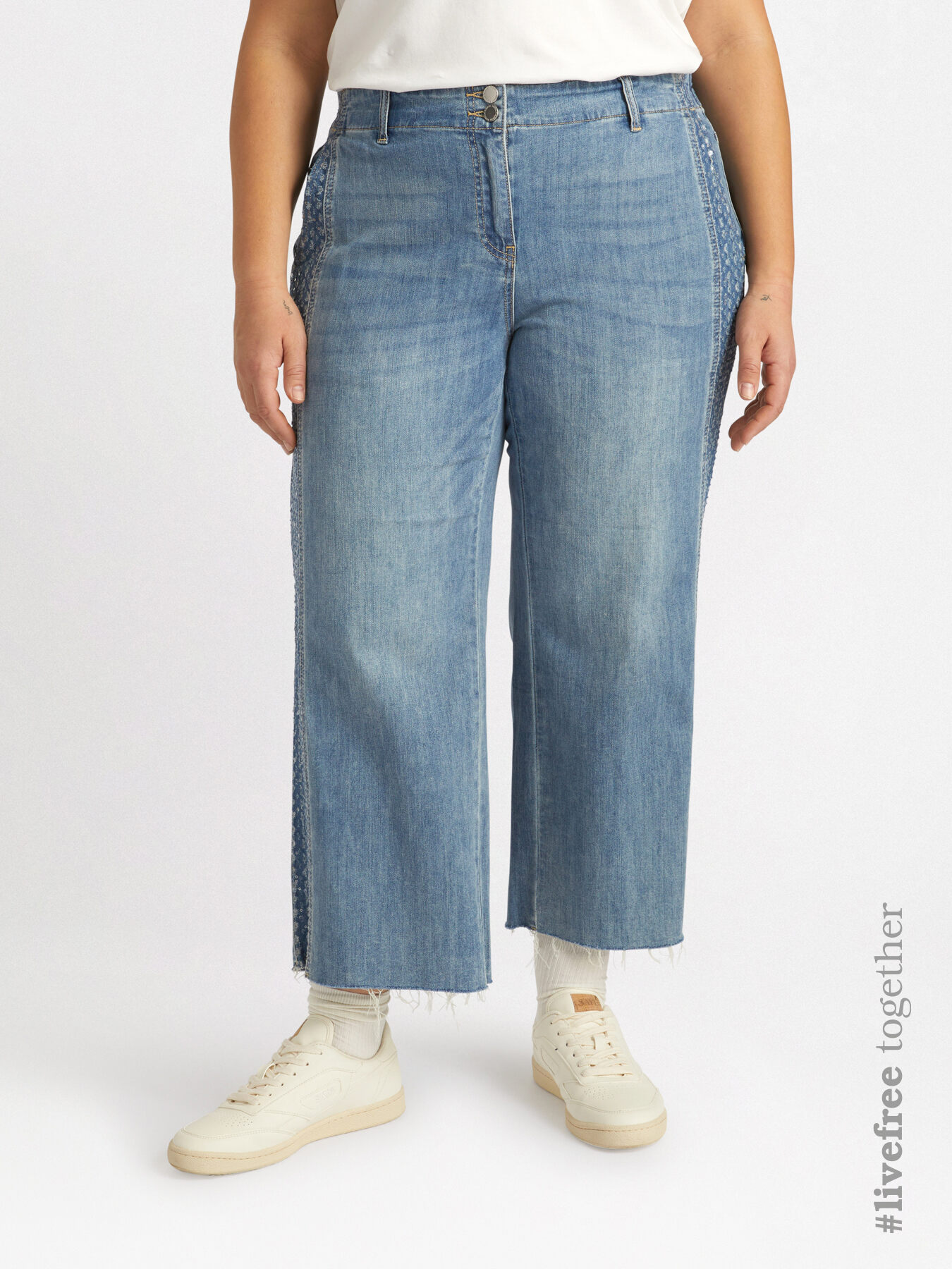 Cropped jeans with trims decorated with micro-tears and sequins image number 0