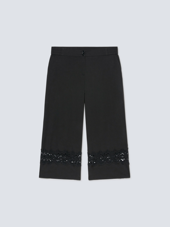 Cropped trousers with lace borders