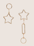 Asymmetric earrings with star image number 0