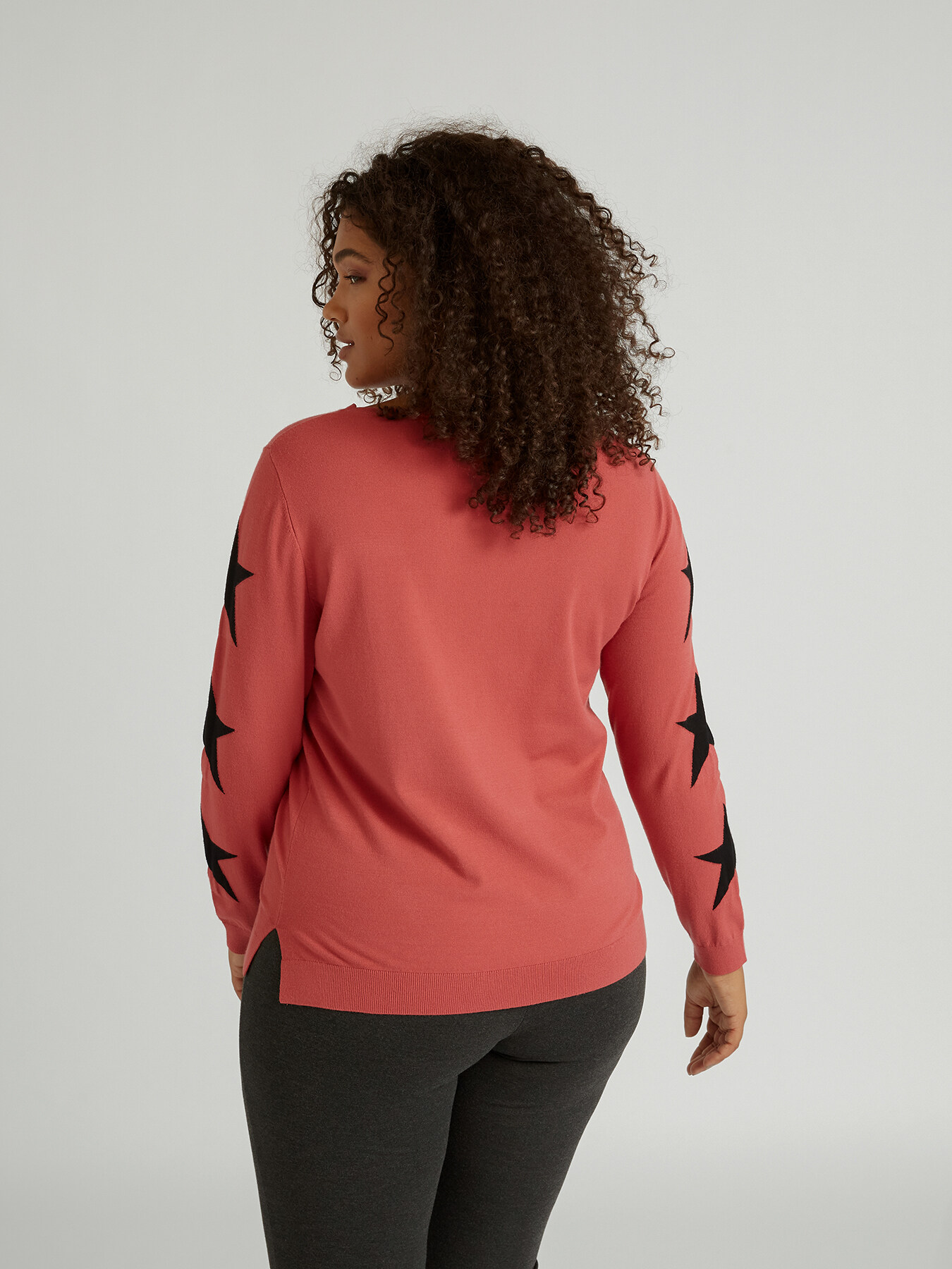 Sweater with stars on the sleeves image number 1