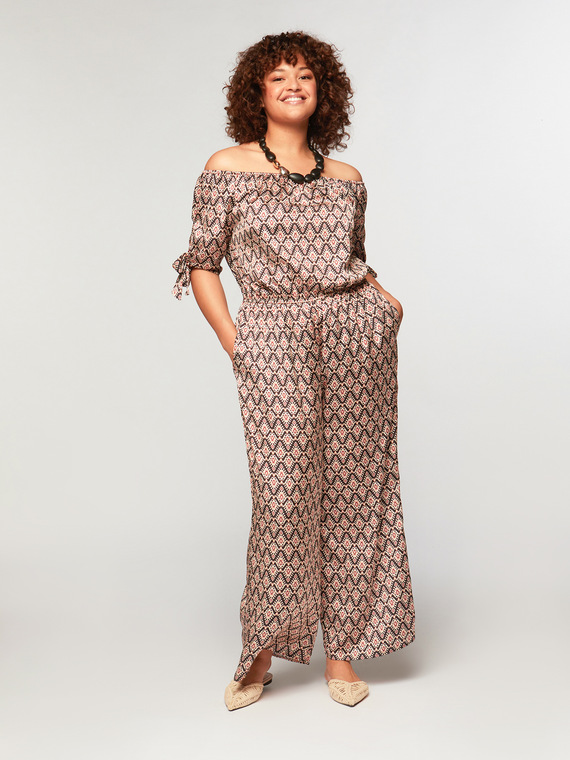 Fiorella Rubino Tuta dalla stampa etnica Donna