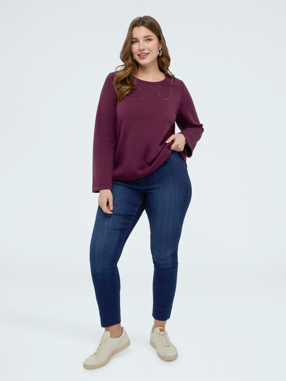 Dark blue jeggings with decorative buttons