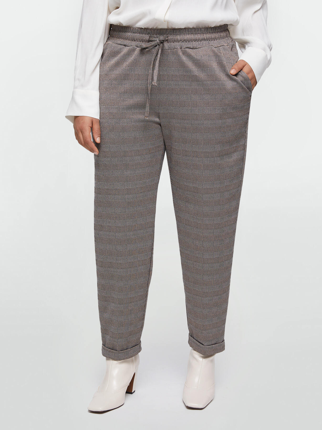 Pantalones joggers con estampado de cuadros de l&uacute;rex image number 0