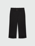 Pantalones cropped con bordados en el bajo image number 4