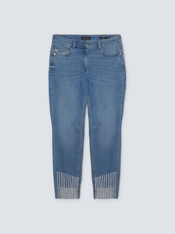 Jeans skinny con frange in strass al fondo