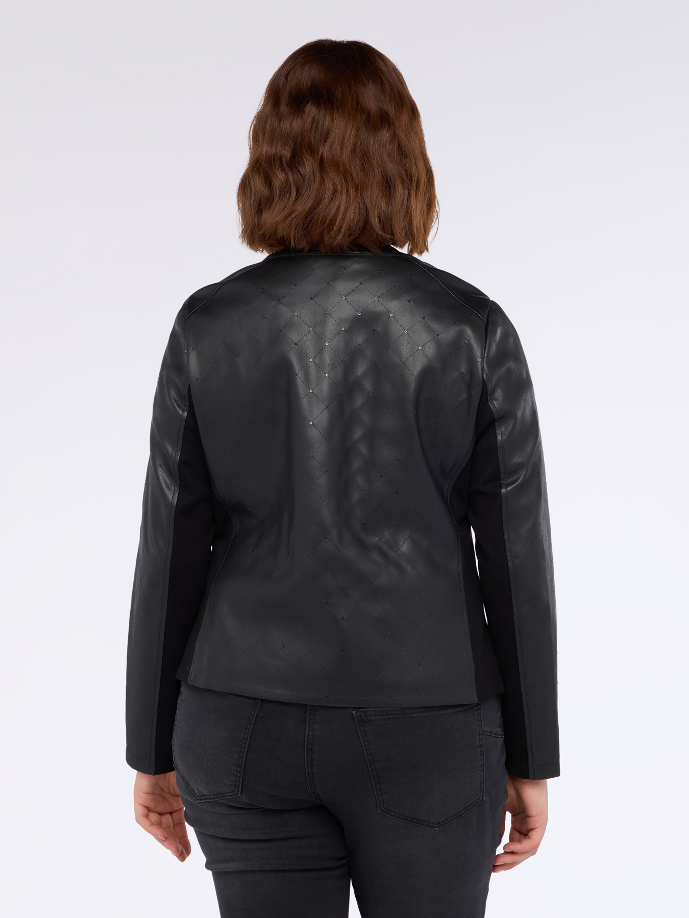 Chaqueta de motorista con puntos de luz y partes en tejido el&aacute;stico image number 1