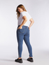 Jeans skinny con borchie al fondo image number 1