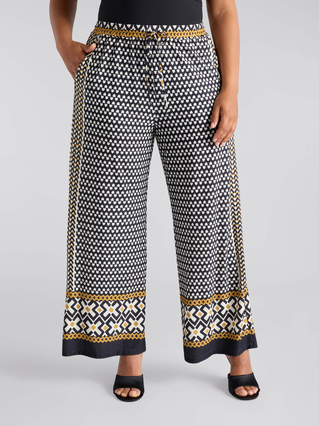 Tribal print trousers image number 3