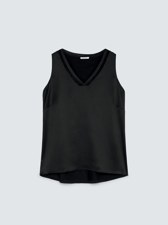 Top avec d&eacute;collet&eacute; en V et d&eacute;tail en dentelle