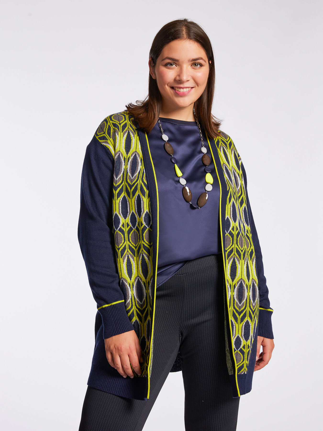 C&aacute;rdigan con dibujos geom&eacute;tricos con bordes fluorescentes image number 0