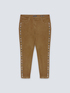 Pantaloni skinny con applicazioni laterali image number 4