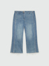 Cropped jeans with trims decorated with micro-tears and sequins image number 4