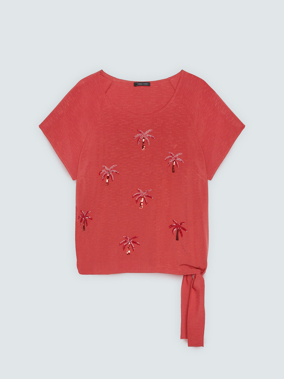 Top with sequin embellishments and bow