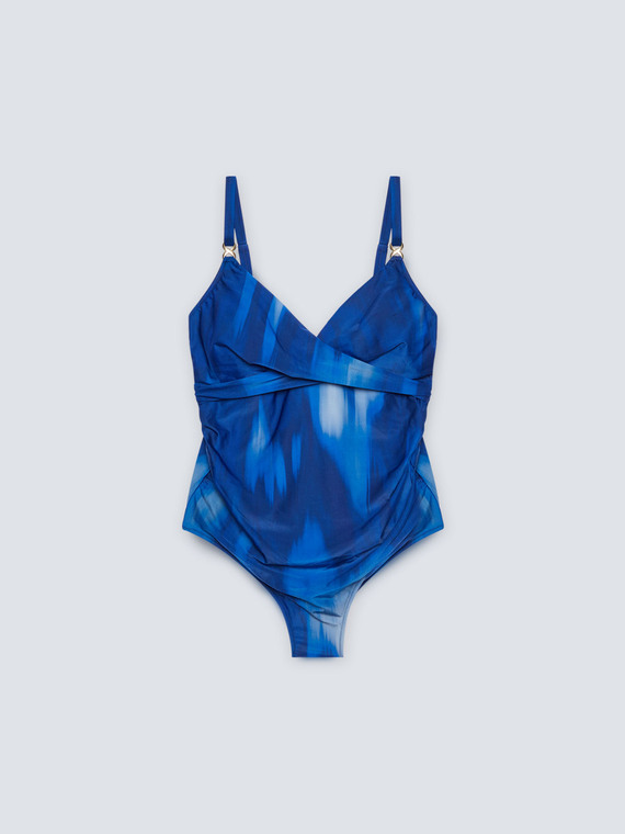 One-piece swimsuit with metal loops