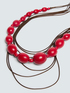 Necklace with red beads and cords image number 2