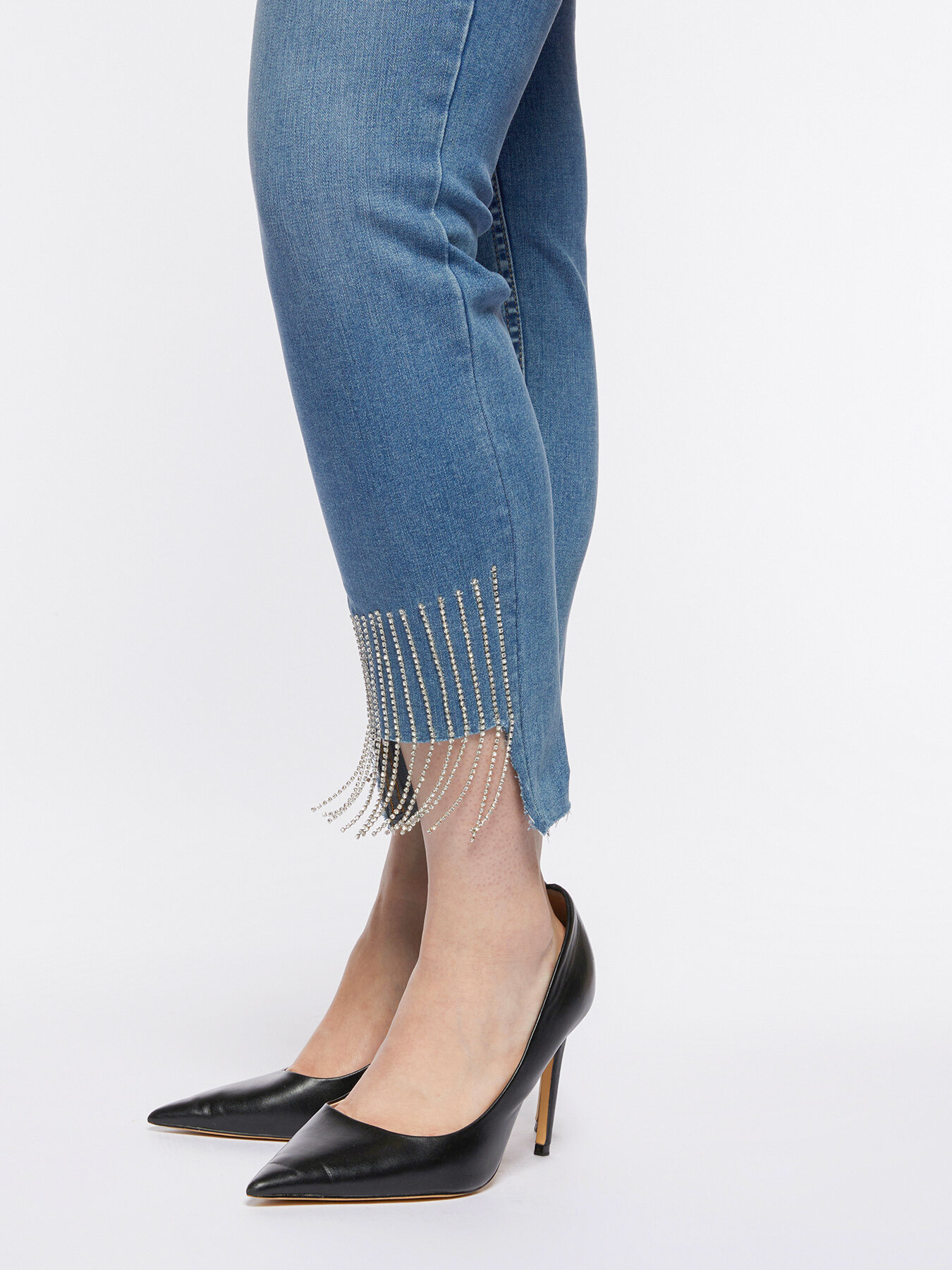 Vaqueros skinny con flecos de pedrer&iacute;a en el bajo image number 3