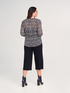 Pantaloni cropped in maglia image number 2