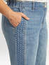Cropped jeans with trims decorated with micro-tears and sequins image number 2