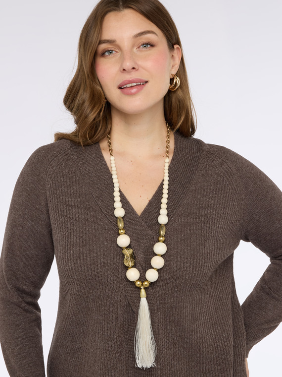 Necklace with beads and decorative tassel