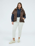 Reversible short-sleeve puffer jacket image number 4