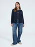 Cardigan in maglia fine con collana applicata image number 4