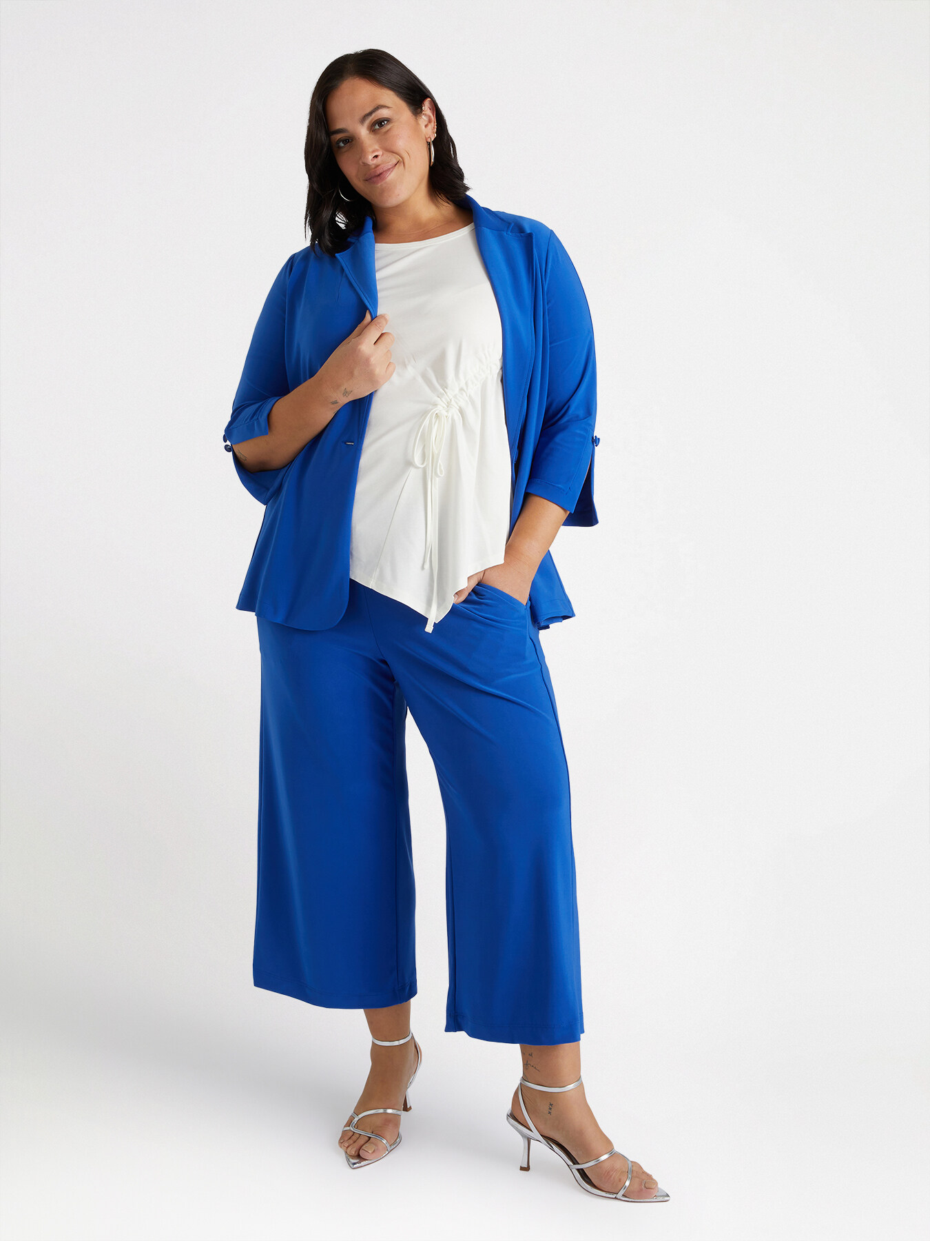 Pantaloni cropped ampi in jersey image number 1