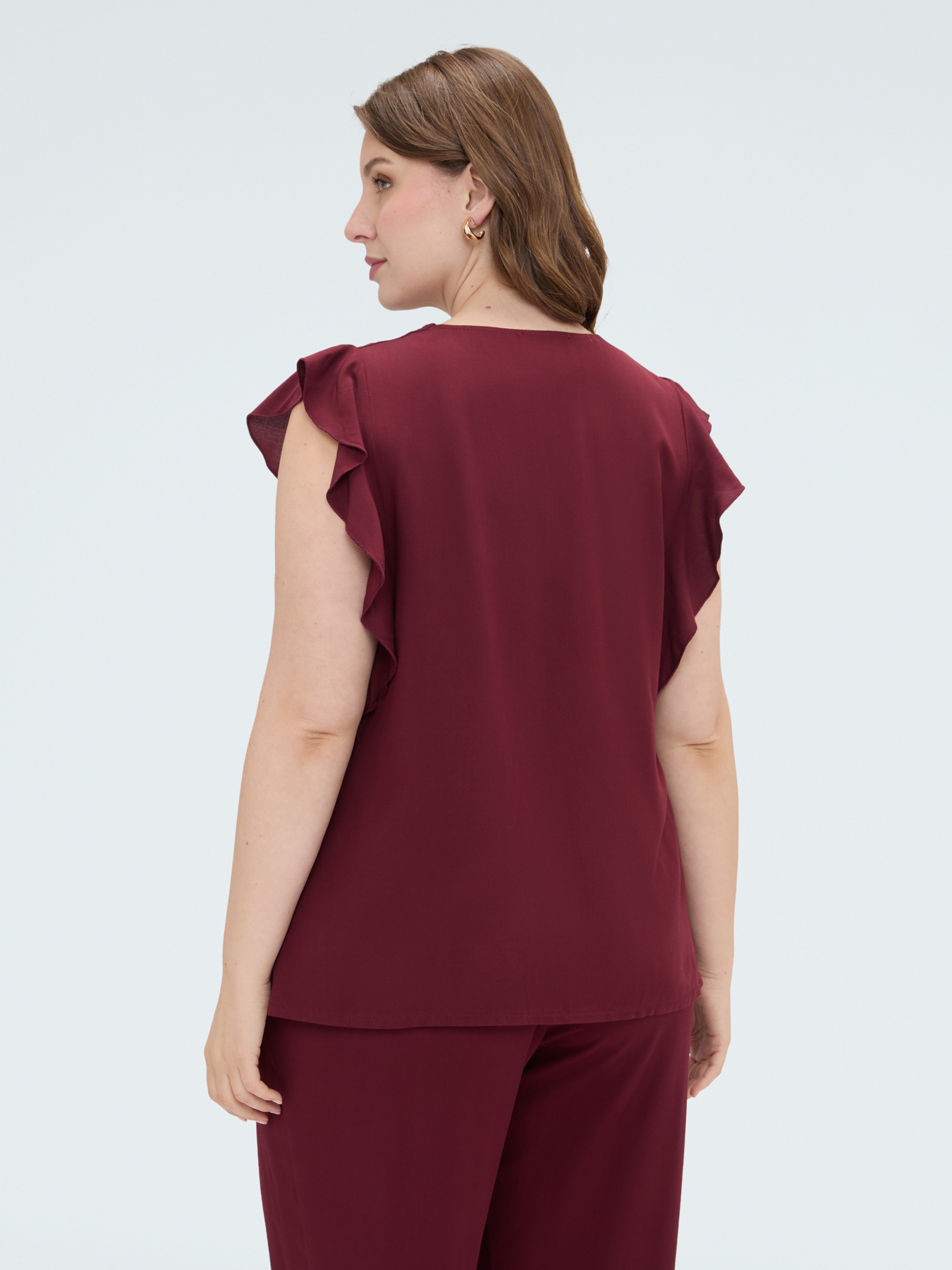 Muslin top with ruffles on the shoulders image number 1