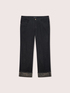 Regular jeans with animal-print cuffs image number 4