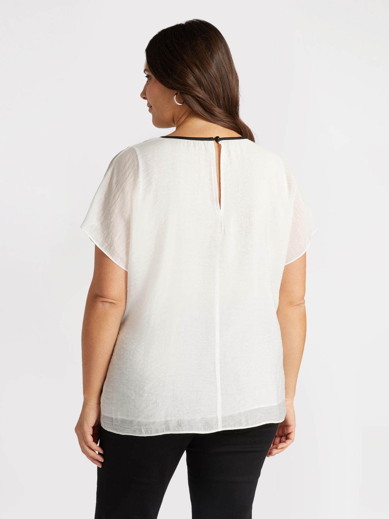 Blouse with black trims and cut-out detail image number 1