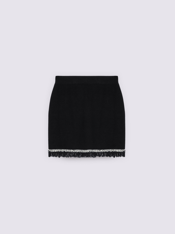 Short tube skirt in knit fabric with fringe