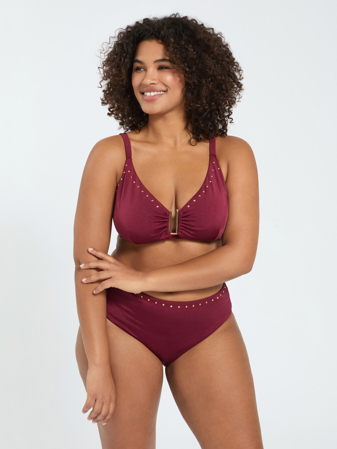 Bikini con borchiette e motivo cut out image number 0