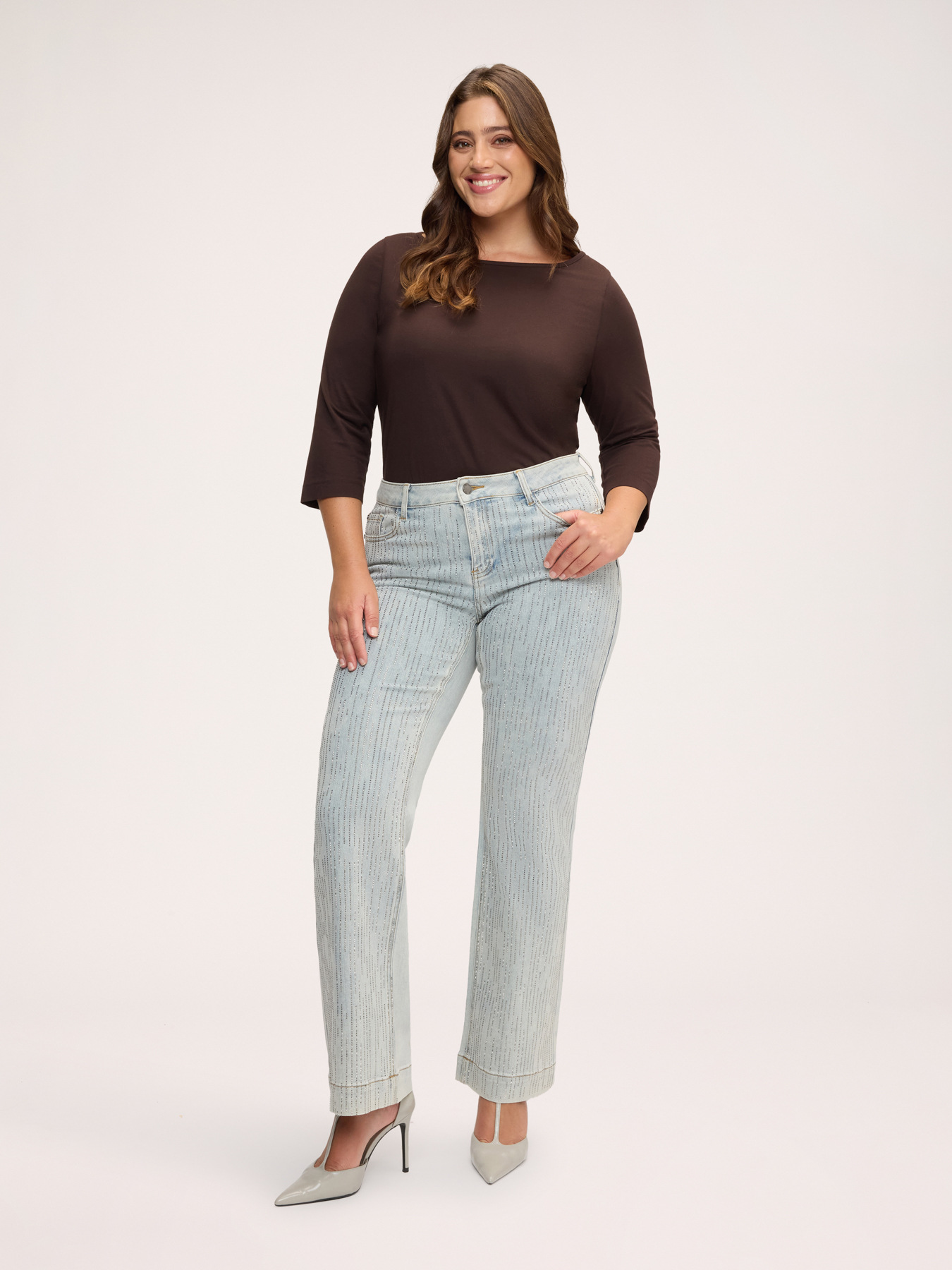Light wash flared jeans with rhinestones image number 2