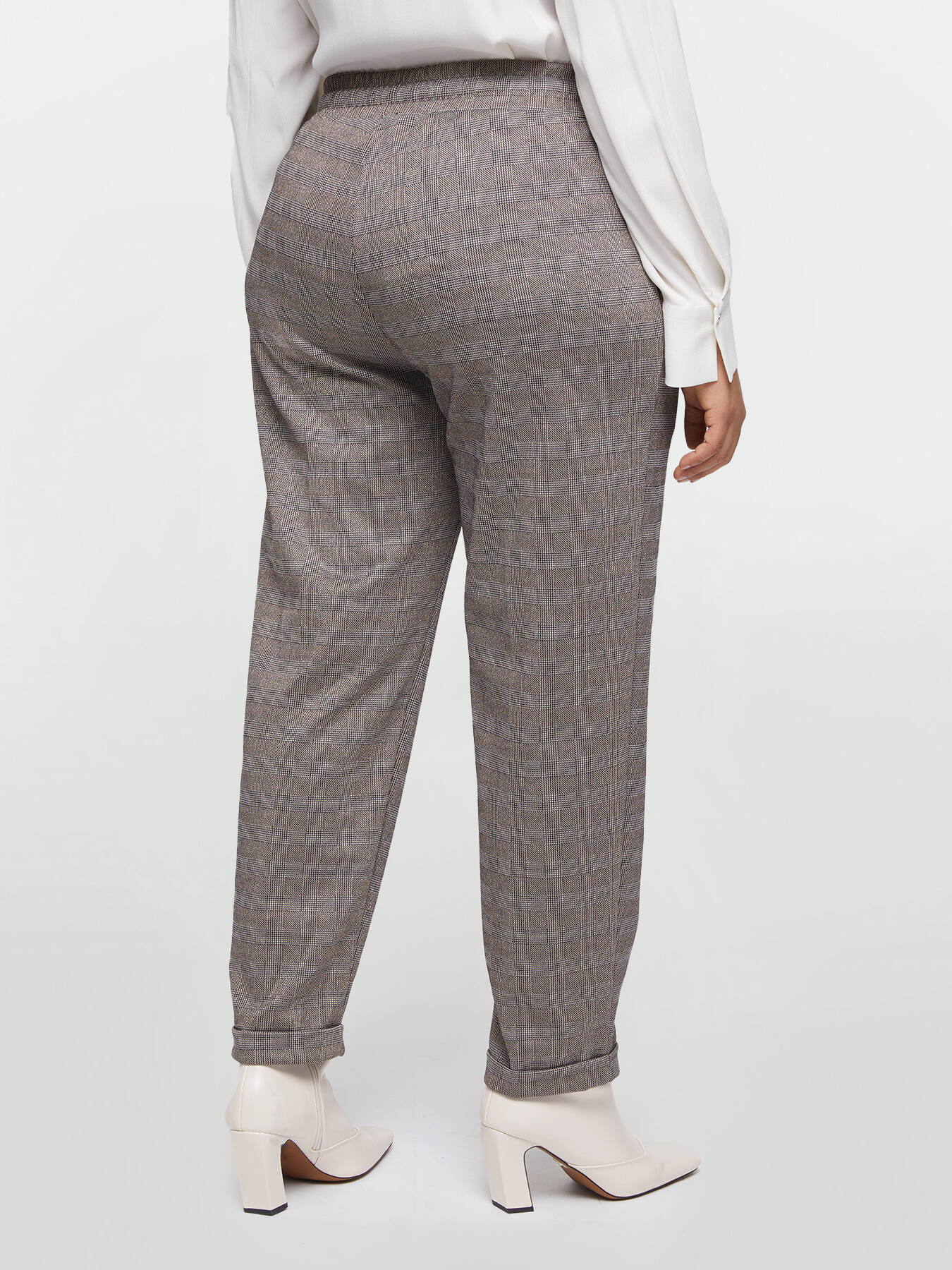Pantalones joggers con estampado de cuadros de l&uacute;rex image number 1