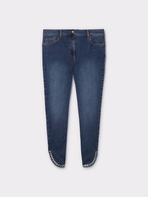 Skinny jeans with studs at the hem