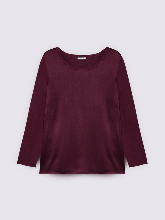 Lang&auml;rmliges Shirt aus zwei Materialien